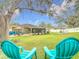 Expansive backyard with two comfy chairs and a view at 1511 Dunn Cove Dr, Apopka, FL 32703