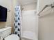 Clean bathroom with shower stall, toilet and storage at 1511 Dunn Cove Dr, Apopka, FL 32703