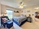 Bright bedroom featuring a double bed and ample natural light at 1511 Dunn Cove Dr, Apopka, FL 32703