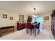 Bright dining room features a wooden table, red chairs, and a chandelier at 1511 Dunn Cove Dr, Apopka, FL 32703