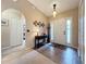 Bright entryway with tile floors and console table at 1511 Dunn Cove Dr, Apopka, FL 32703