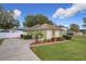 One story house, attached garage, green exterior,landscaped yard at 1511 Dunn Cove Dr, Apopka, FL 32703