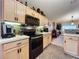 Well-equipped kitchen boasts stainless steel appliances and ample counter space at 1511 Dunn Cove Dr, Apopka, FL 32703