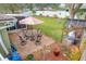 Spacious patio with seating area and umbrella, perfect for outdoor dining at 1511 Dunn Cove Dr, Apopka, FL 32703