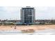 Oceanfront building with beach access, showcasing stunning coastal views at 1513 Ocean Shore Blvd # 8F, Ormond Beach, FL 32176