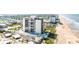 Oceanfront property featuring a pool and nearby beach access at 1513 Ocean Shore Blvd # 8F, Ormond Beach, FL 32176