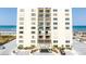 Ocean view high-rise building, showcasing its architectural design and beachfront location at 1513 Ocean Shore Blvd # 8F, Ormond Beach, FL 32176