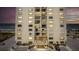 Oceanfront building with lighted entrance at 1513 Ocean Shore Blvd # 8F, Ormond Beach, FL 32176