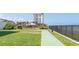 Oceanfront lawn with shuffleboard court and building view at 1513 Ocean Shore Blvd # 8F, Ormond Beach, FL 32176