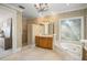 Spa-like bathroom featuring a soaking tub and shower at 1522 Lake Knowles Cir, Winter Park, FL 32789