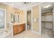 Bright bathroom with vanity, toilet and walk-in closet at 1522 Lake Knowles Cir, Winter Park, FL 32789