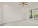 Bedroom with french doors leading to patio at 1522 Lake Knowles Cir, Winter Park, FL 32789