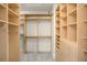 Spacious walk-in closet with ample shelving and rods at 1522 Lake Knowles Cir, Winter Park, FL 32789