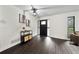 Bright and airy entryway with dark hardwood floors at 1523 N Beach St, Ormond Beach, FL 32174