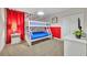 bedroom with bunk beds and Mickey Mouse decor at 1533 Maidstone Ct, Champions Gate, FL 33896