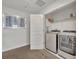 Convenient laundry room with washer and dryer at 1533 Maidstone Ct, Champions Gate, FL 33896