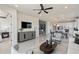 Open concept living room and kitchen with modern decor at 15819 Gem View St, Winter Garden, FL 34787