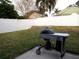 Private backyard with a patio and grill at 1621 Slash Pine Pl, Oviedo, FL 32765