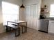 Modern kitchen with a breakfast nook and a large island at 1621 Slash Pine Pl, Oviedo, FL 32765