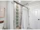 Spa-like shower with marble and mosaic tile, and a frameless glass enclosure at 1706 Tiverton St, Winter Springs, FL 32708