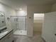 Bathroom with shower, vanity, and linen closet at 1794 Hackberry St, Clermont, FL 34715