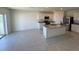 Spacious kitchen with an island and plenty of cabinet space at 1794 Hackberry St, Clermont, FL 34715