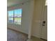 Bright living room with large windows offering scenic views at 1794 Hackberry St, Clermont, FL 34715