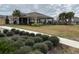 Community pool area with covered pavilion and landscaping at 1794 Hackberry St, Clermont, FL 34715