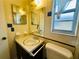 A second bathroom with a toilet and sink at 1854 Sepalwood Ct, Orlando, FL 32818