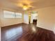 Spacious bedroom with hardwood floors and a view at 1854 Sepalwood Ct, Orlando, FL 32818