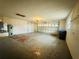 Attached garage with shelving and overhead door at 1854 Sepalwood Ct, Orlando, FL 32818