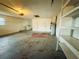 Spacious garage with washer, dryer, and shelving at 1854 Sepalwood Ct, Orlando, FL 32818