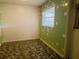 Small kitchen area with green tile and window at 1854 Sepalwood Ct, Orlando, FL 32818