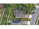 Aerial view of house showing roofline, landscaping and solar panels at 2041 Brillante Dr, St Cloud, FL 34771