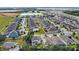 Aerial view of neighborhood with various houses and landscape at 2041 Brillante Dr, St Cloud, FL 34771