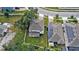 Aerial view showing the house and backyard with solar panels at 2041 Brillante Dr, St Cloud, FL 34771