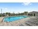 Community pool with lounge chairs and patio area at 2041 Brillante Dr, St Cloud, FL 34771