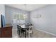 Casual dining area with round table and chairs, near kitchen at 2041 Brillante Dr, St Cloud, FL 34771