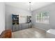 Playroom with built-in shelving, toy storage, and a chandelier at 2041 Brillante Dr, St Cloud, FL 34771