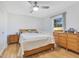 Bedroom with full-size bed, dresser and ceiling fan at 20493 Majestic St, Orlando, FL 32833