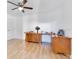 Home office with built-in desk and ceiling fan at 20493 Majestic St, Orlando, FL 32833