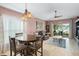 Dining area with table and chairs near living room at 2204 Napone Ln, Minneola, FL 34715