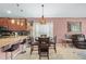 Bright dining area with table and chairs near kitchen at 2204 Napone Ln, Minneola, FL 34715