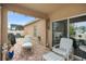 Relaxing covered patio with brick flooring and comfortable seating at 2204 Napone Ln, Minneola, FL 34715