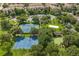 Aerial view of community tennis and basketball courts at 2546 Renshaw St, Kissimmee, FL 34747