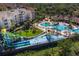 Aerial view of community pool, water park, and resort at 2546 Renshaw St, Kissimmee, FL 34747