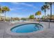 Relaxing community hot tub with surrounding lounge chairs at 2546 Renshaw St, Kissimmee, FL 34747