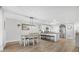 Dining area with kitchen view and light wood table at 300 S Brighton Dr, Port Orange, FL 32127