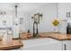 Kitchen island with farmhouse sink and butcher block top at 300 S Brighton Dr, Port Orange, FL 32127