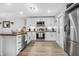 Modern kitchen with white cabinets and butcher block island at 300 S Brighton Dr, Port Orange, FL 32127